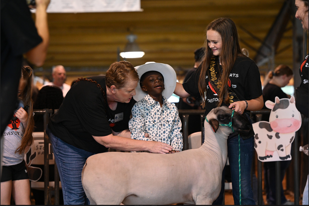 Kinsley Rhodes, the founder of the special hearts show, teaching showmanship techniques.