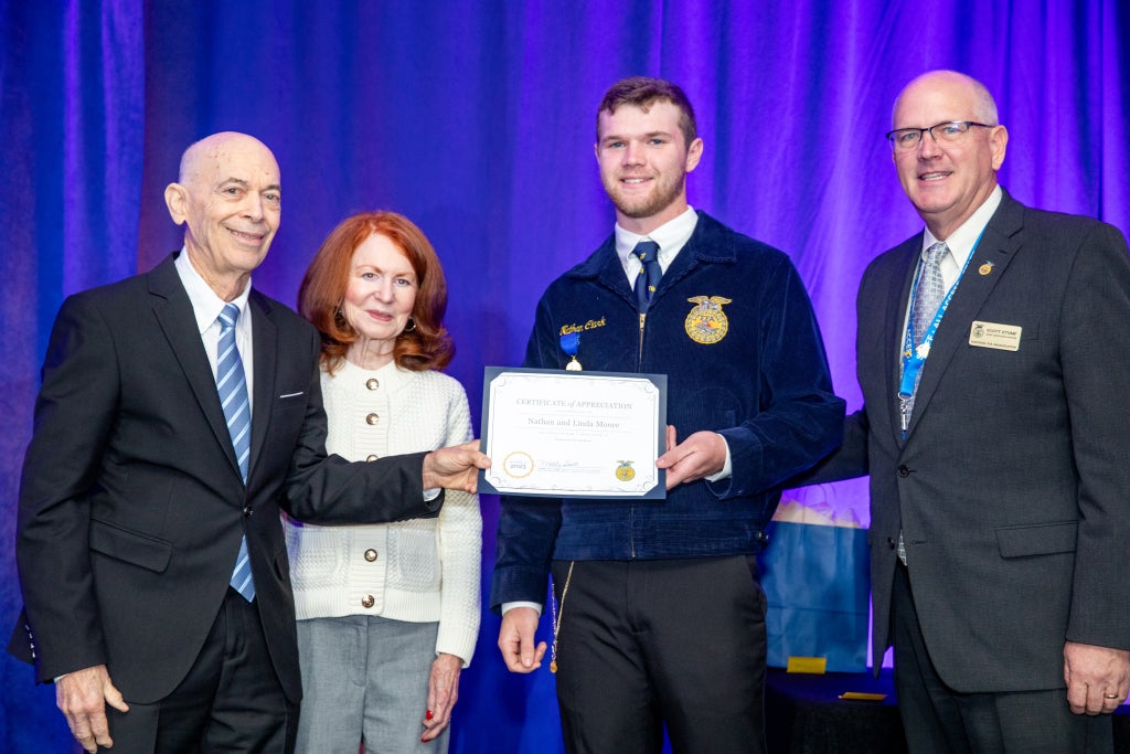 Nathan and Linda Moore were recently recognized at the 98th National FFA Convention & Expo as 10-year milestone donors. 