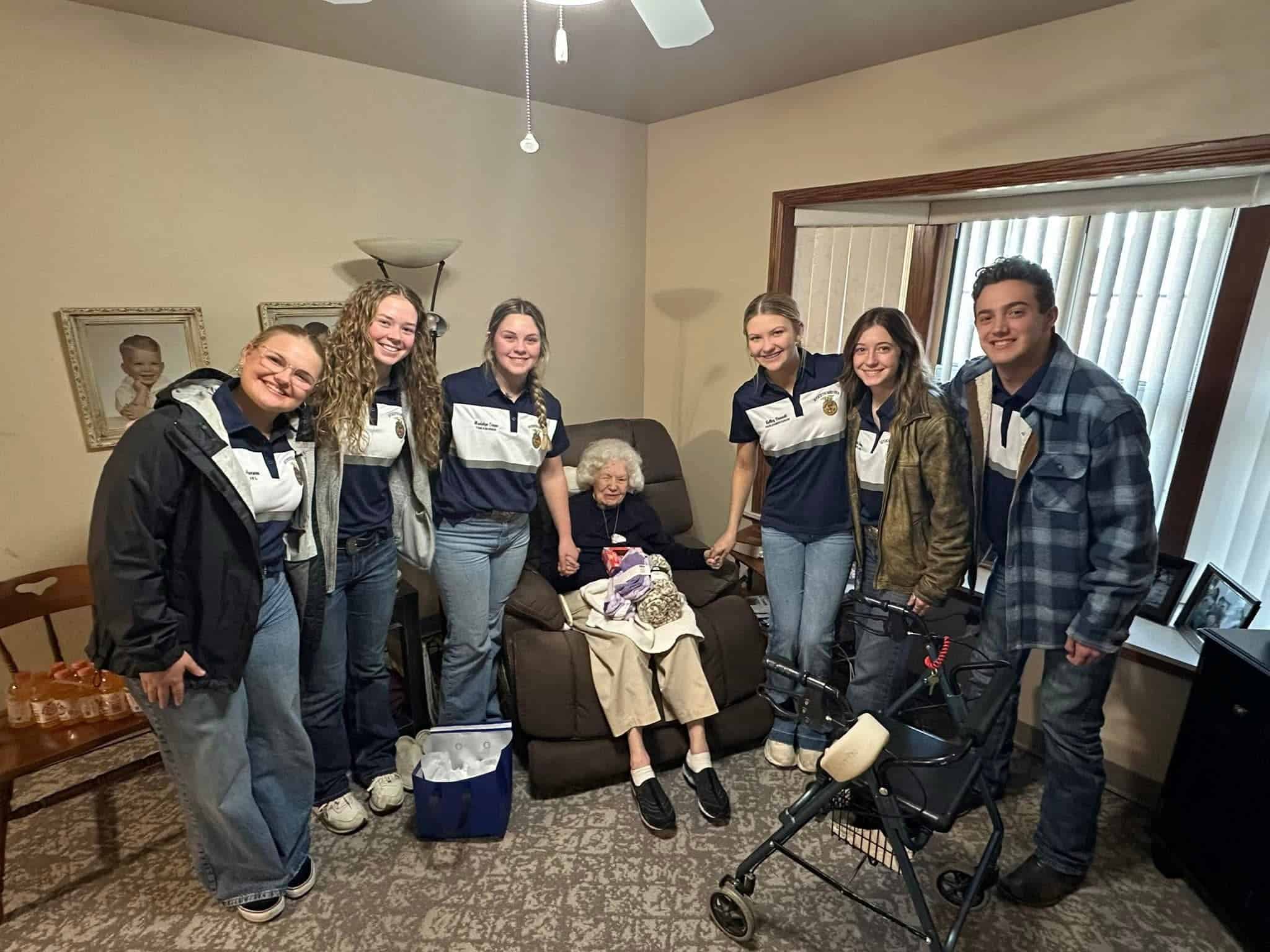 Spreading holiday cheer through giving gifts.