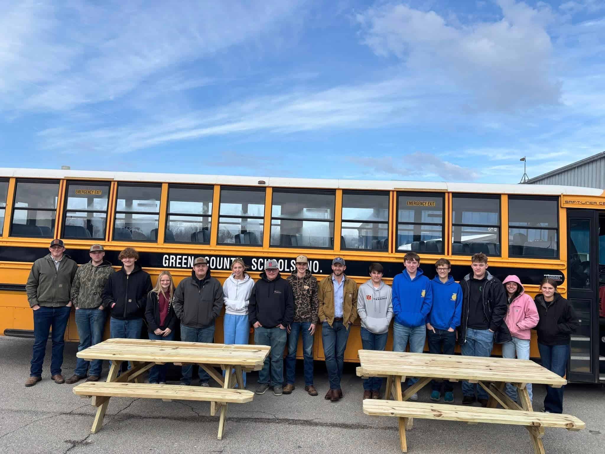 Green County FFA members with the picnic tables that the Ag Construction class built and donated to the Kentucky Department of Agriculture. 
