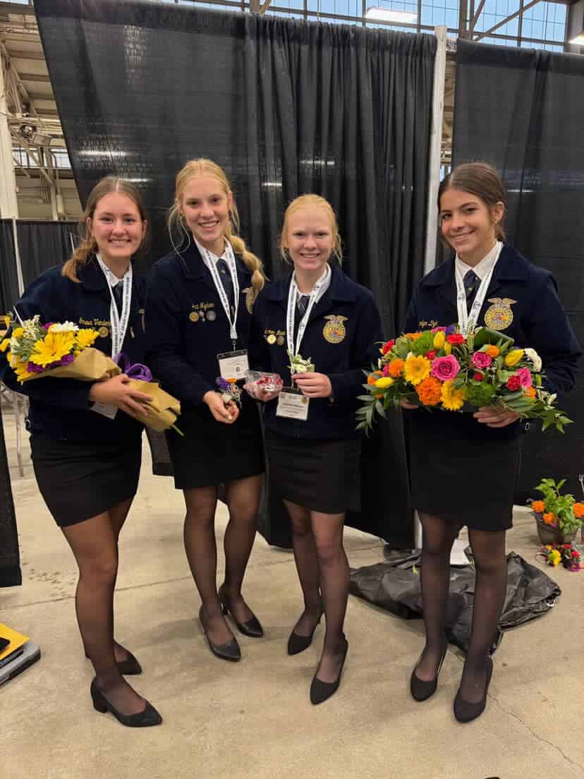 The team after the National FFA competition with their completed floral design pieces. Pictured from left to right are Geneva Vandenberg, Laci Nydam, Lauren Mouw and Gracelyn Dyk.