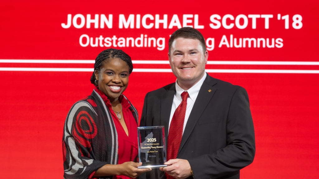 John Michael Scott accepts the Outstanding Young Alumni Award.