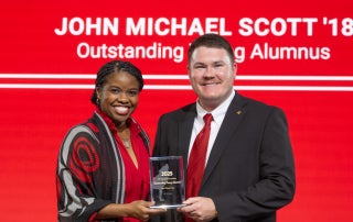 John Michael Scott accepts the Outstanding Young Alumni Award.