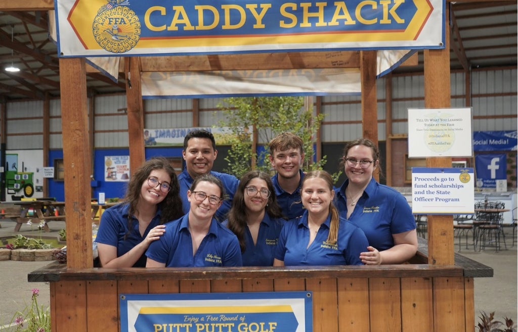 The Indiana FFA State Officer Team at the pavilion’s Caddy Shack