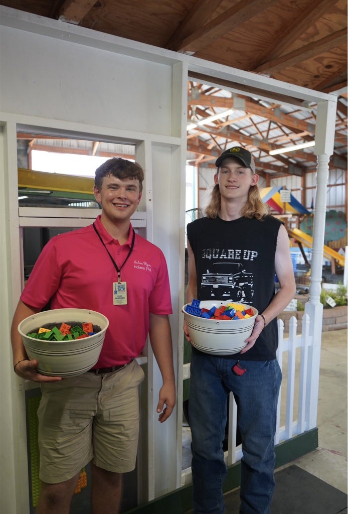 Calvin Myers (left) with an Indiana FFA member.