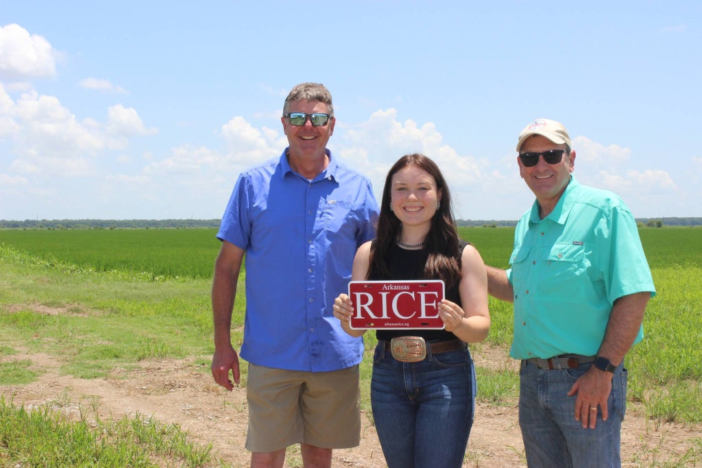 2024 Arkansas Rice Representative Kaitlyn Spencer (middle) with Arkansas Rice industry leaders.