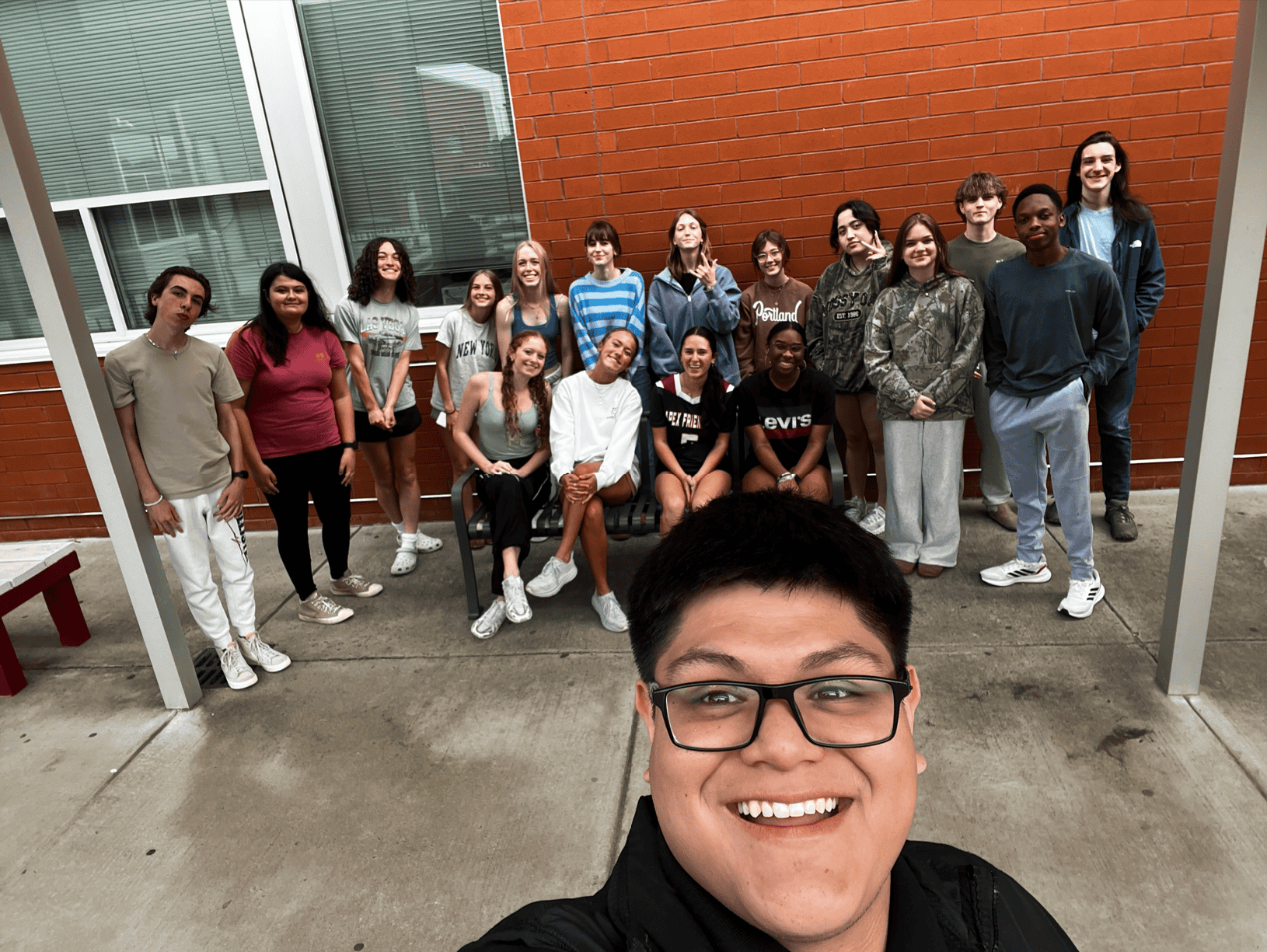 Kevin Manzanarez with one of his Animal Science classes outside Apex Friendship High School during student teaching.