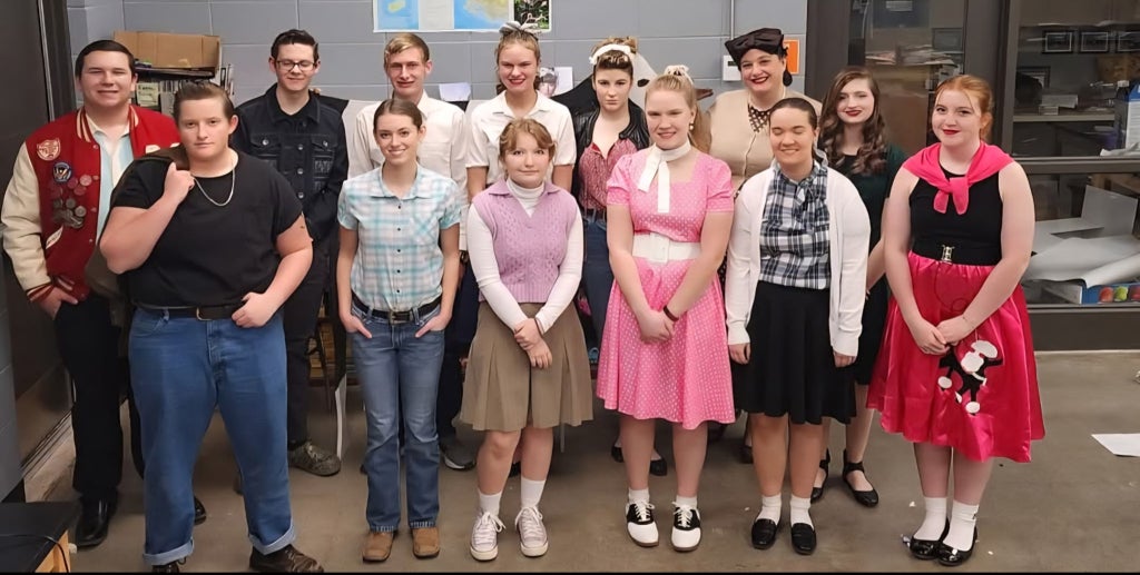 Members prepare for a lively night with a ’50s Sock Hop theme.