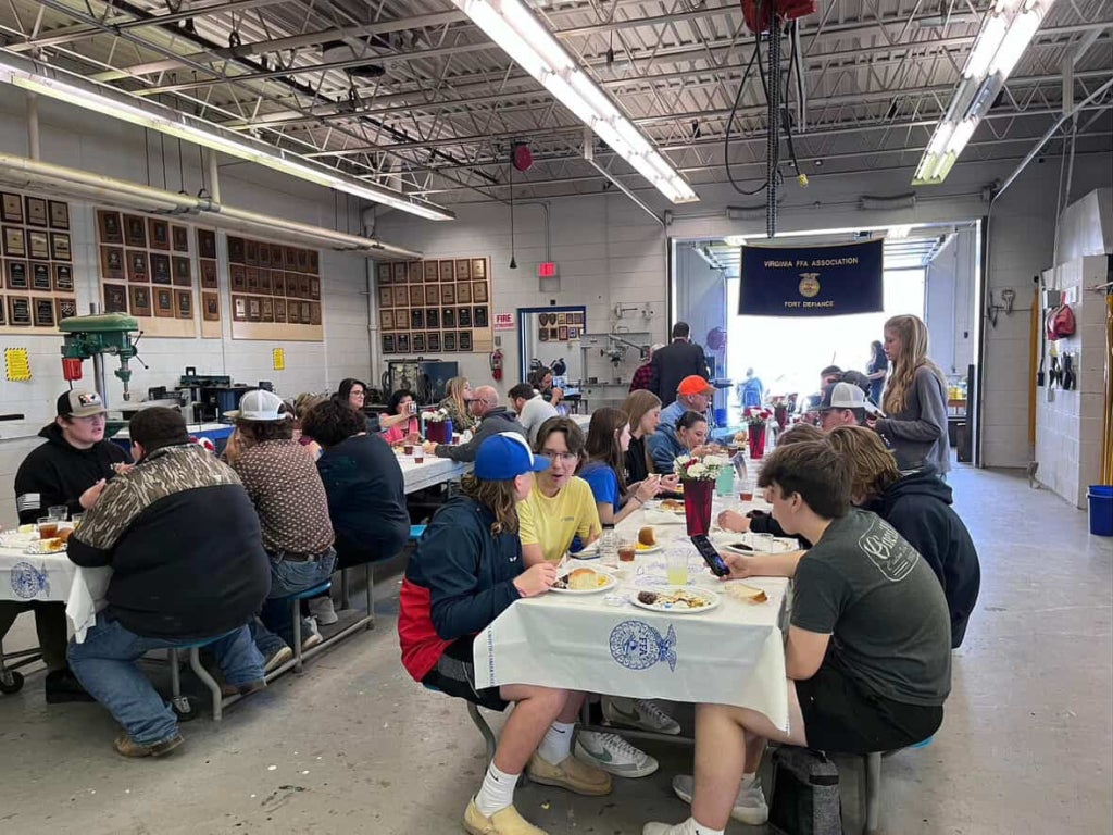 Fort Defiance FFA members enjoy the venison feast.