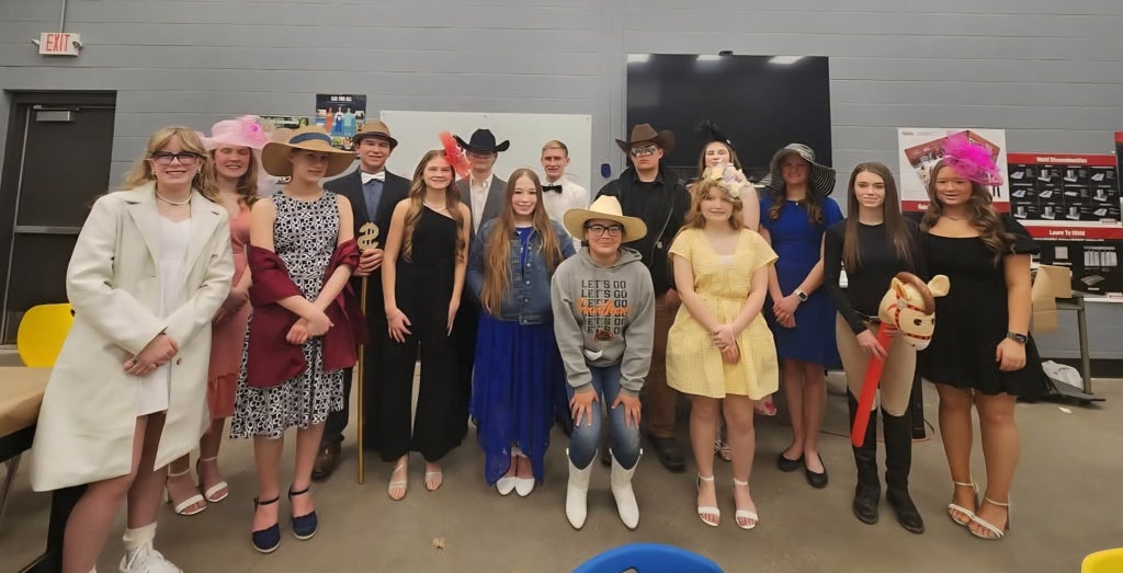 Palmyra FFA members clad in their finest Kentucky Derby attire for the Murder Mystery Night.