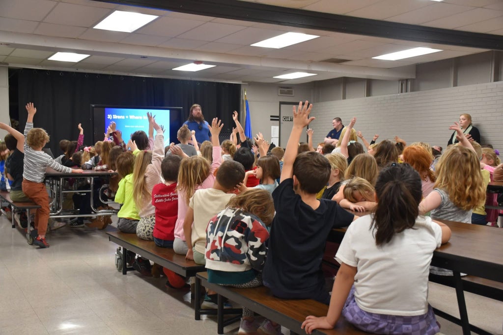 Midwest Storm Chasers teach Miami Elementary students about severe weather.