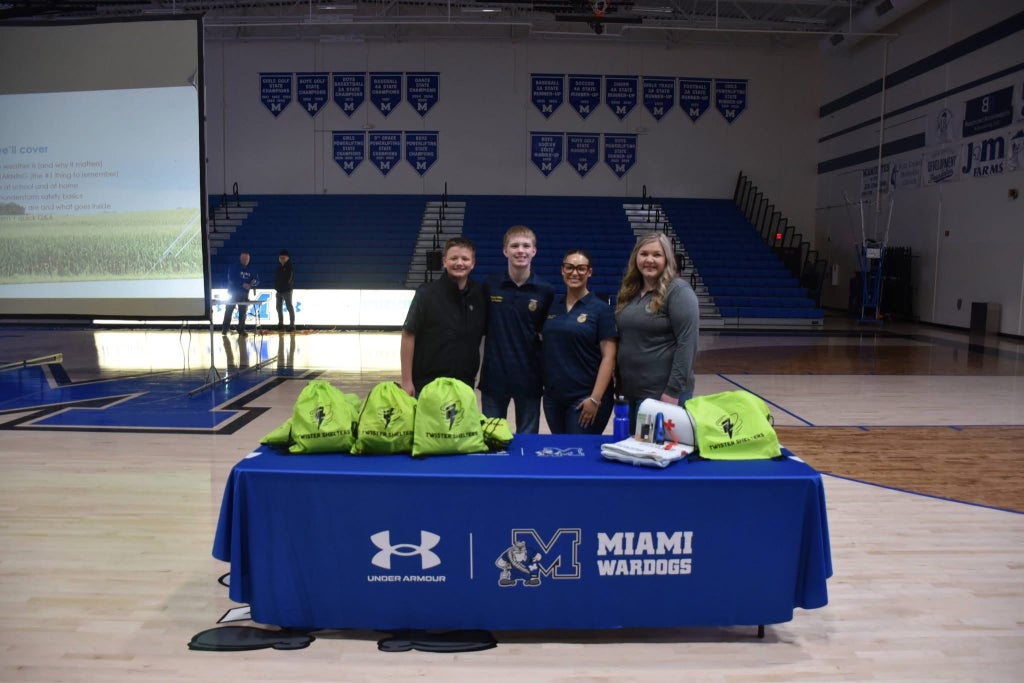 Miami FFA officers Cooper Harrison, Bryson Walker and Tylor Aary with advisor Shelby Bergman.