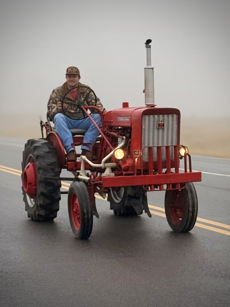 This International Harvester Farmall 140 was made in 1970 and is used for cultivating crops and light agricultural work.
