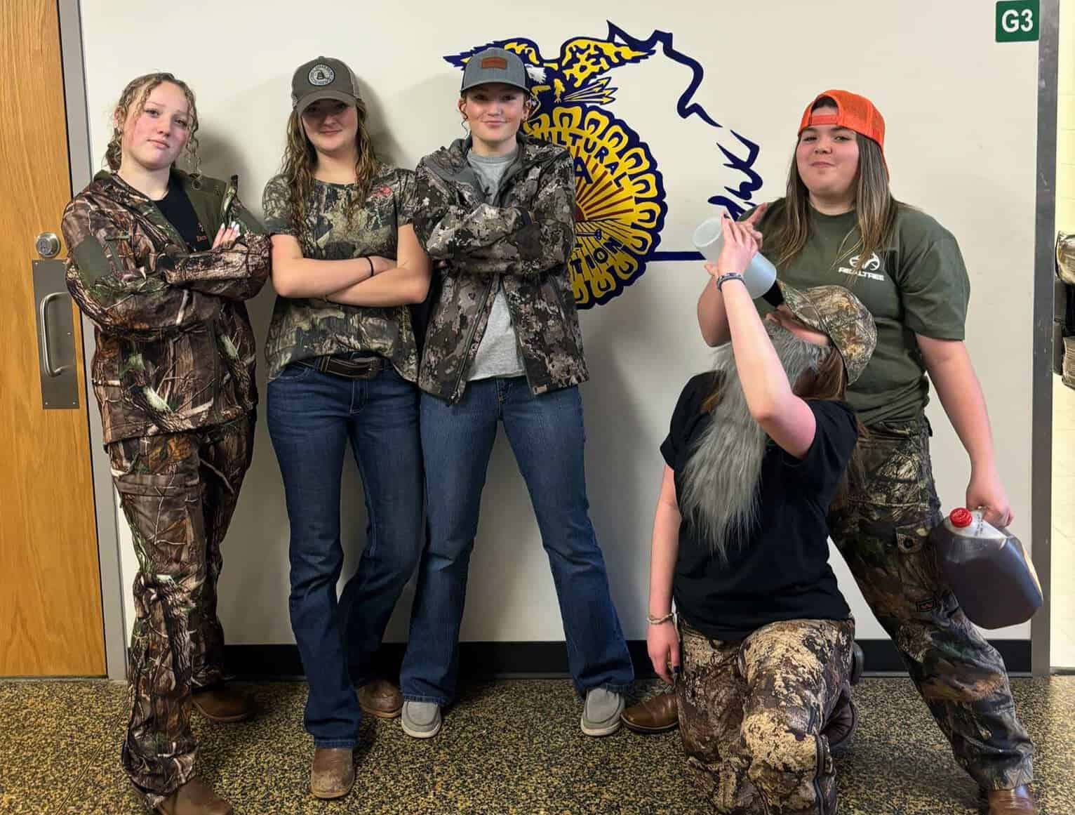 2023-24 Chapter Officers Raegan Delagardelle, Madison Stephens (reporter), Brailey Jenkins (treasurer), Danika Landreth (vice president) and Avah Bache (vice president) participate in the Culpeper County FFA Chapter’s Yellowstone vs. Duck Dynasty spirit day.