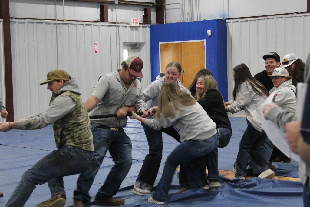 Vinita FFA members participate in tug-of-war at the Aggie Olympics competition.