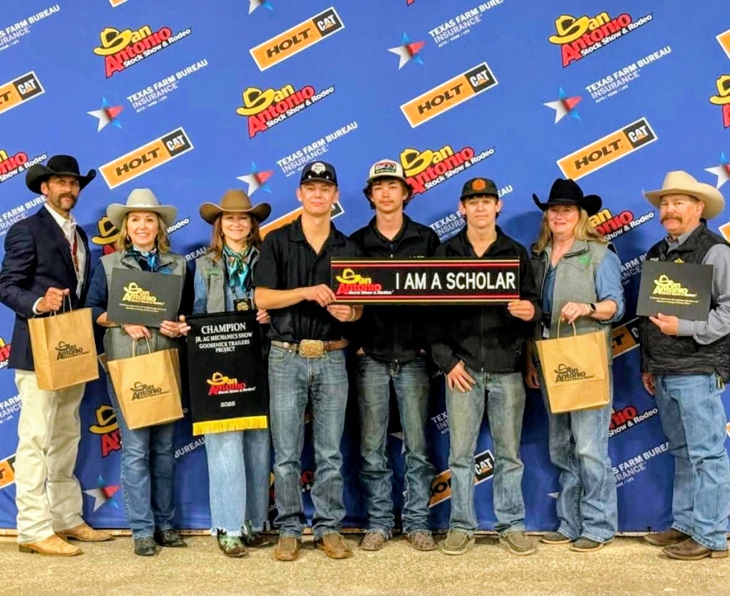 West Hardin Ag Mech celebrates their Grand Champion win.