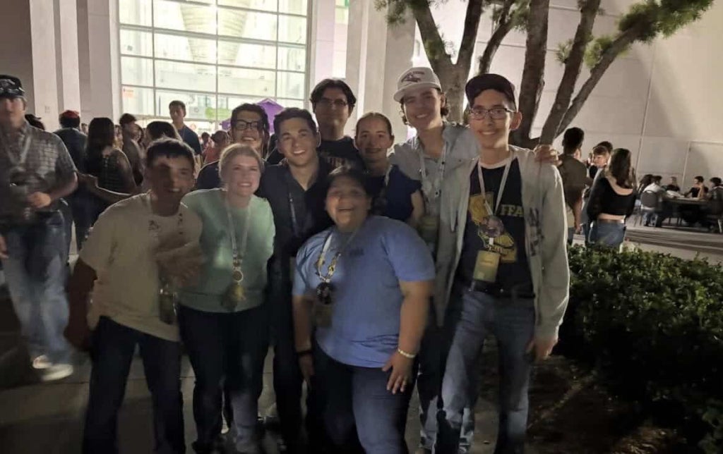 Alcaraz and Hanford FFA members Kate Rose, Isaih Escalra, Sarah Juliza, Frank Espinola, Hunter Freitas, Darren Defteroes and Tabitha Hitchman.