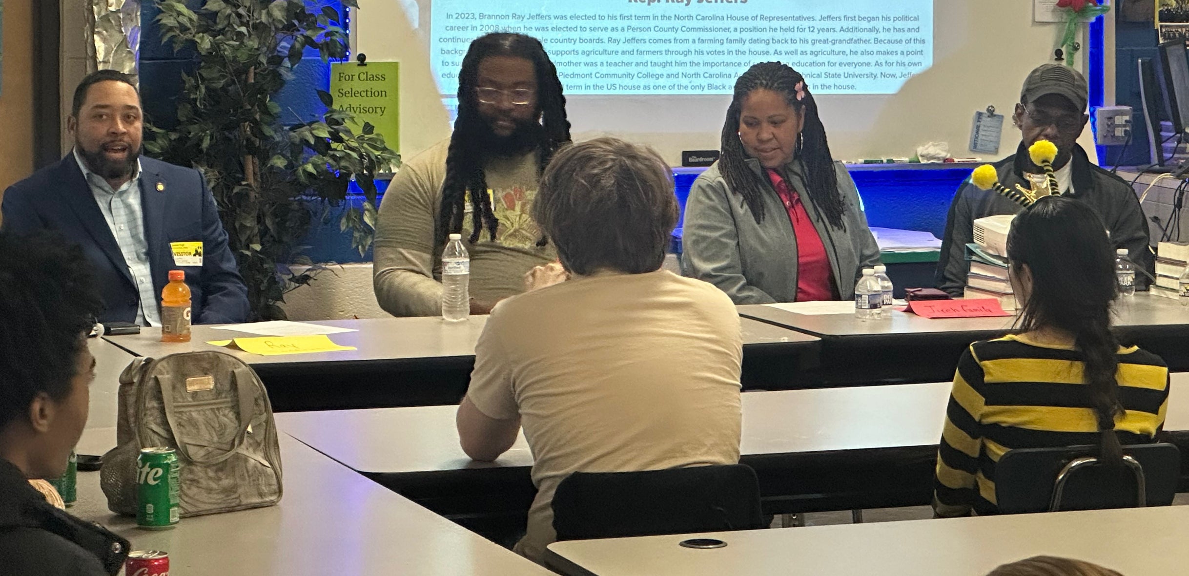 Panelists speaking to students about their agriculture experiences.