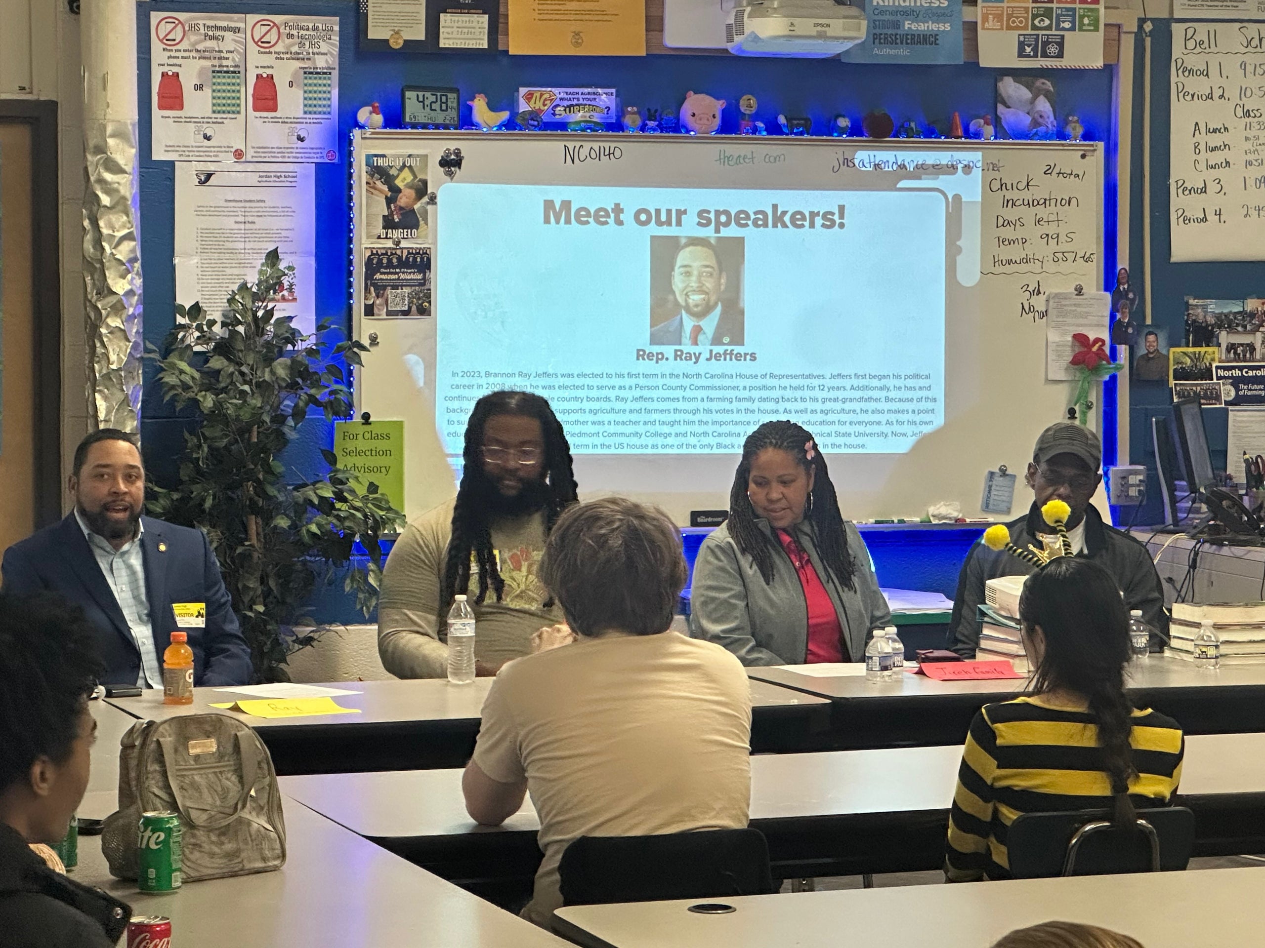 Panelists speaking to students about their agriculture experiences.
