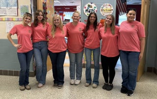 Currituck County FFA Officers infront of the Kindergarten classroom