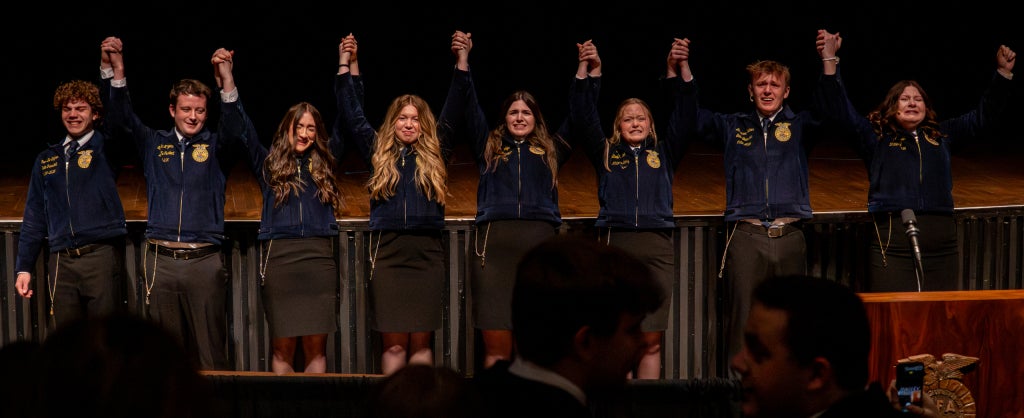 The 2025-2026 Michigan FFA State Officer Team’s final bow. Left to right: State President Brent DeSaegher, State Vice President William Rogers, State Reporter Jessica Peters, State Sentinel Carly VanderRoest, State Vice President At-Large Keira Fudge, State Secretary Caty Janicek, State Treasurer Andersen Zachar and State Vice President At-Large Lizzie Hartmann.