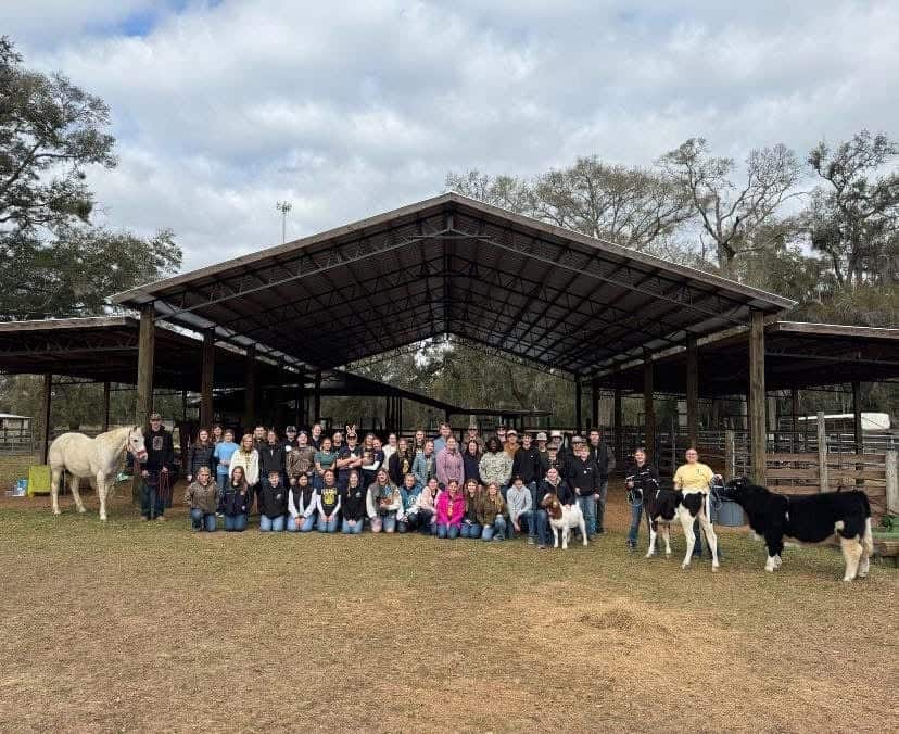 Chiefland FFA members and animals gather at the farm, waiting for Fun Day on the Farm to begin.