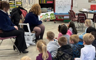 FFA Members Read to students about agricultural footwear