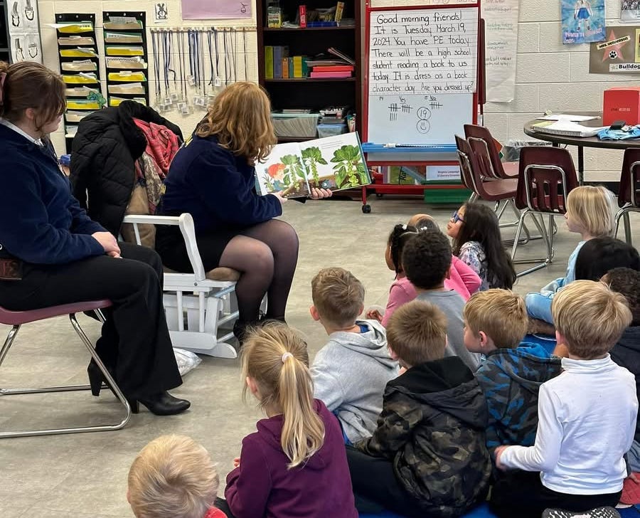 FFA Members Read to students about agricultural footwear