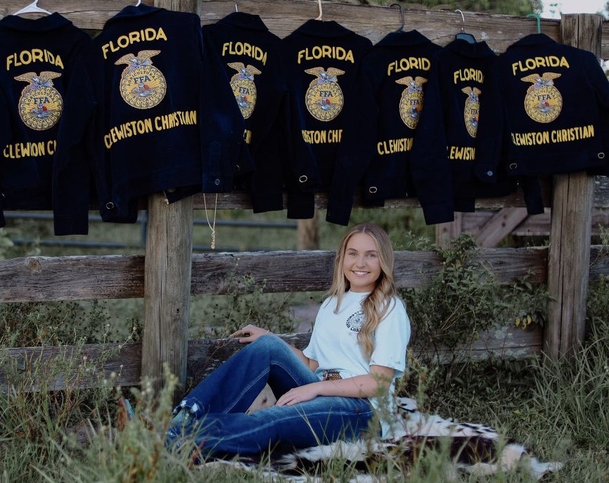 Branaman sits proudly among the blue jackets that symbolize FFA leadership and tradition.