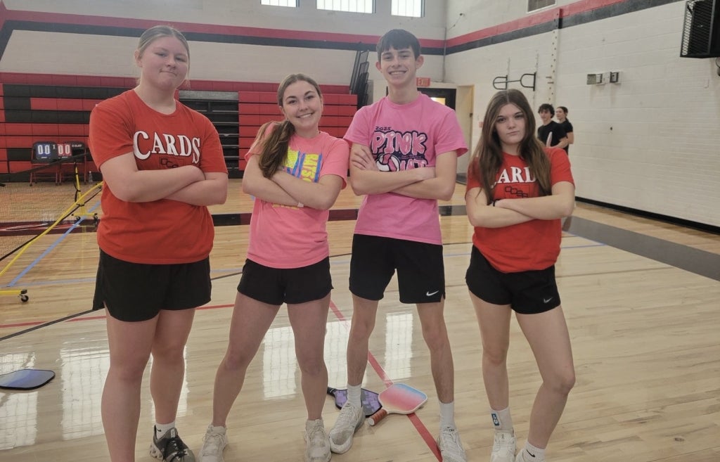 The Dinkers and Lob Squad teams pose for a picture before their games at the North Clay FFA pickleball tournament.