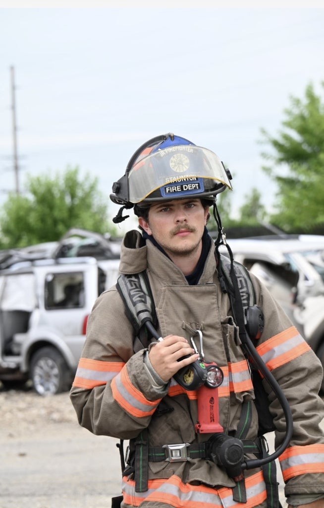 Nelson Milner wearing his firefighter gear at Cadet Explorer Fire School.