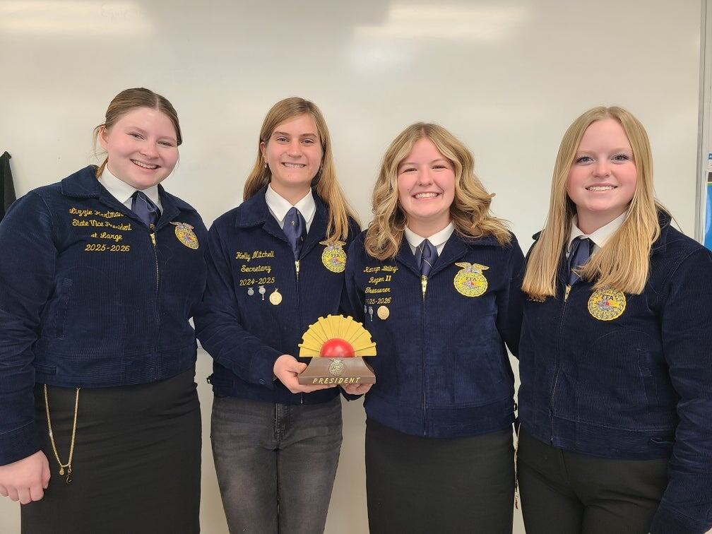 Holly Mitchell (second from left), Lenawee Tech Center AM president, stands next to Kamryn Billings, (second from right) Lenawee Tech Center PM president, Caty Janicek (far right), 2025-26 Michigan FFA state secretary, and Lizzie Hartmann (far left), 2025-26 Michigan FFA vice president at-large.
