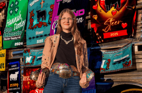 Hannah Dooley poses with her awards.