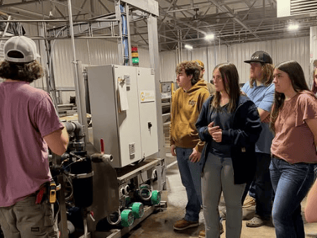 Madison County horticulture students visit Greenswell Growers to learn about large-scale greenhouse production and operations.
