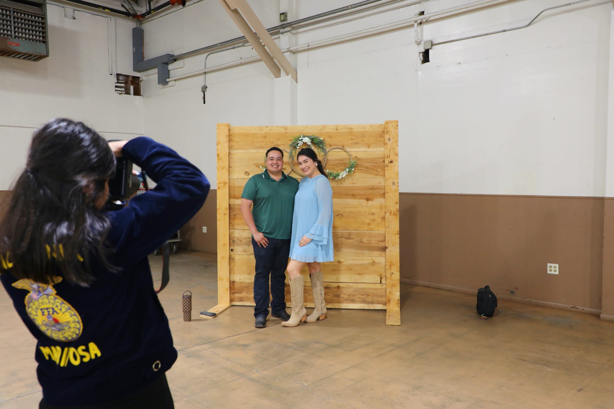 Cole taking photos at the Merced Farm Bureau Meeting. Photo taken by Arianna Stone.