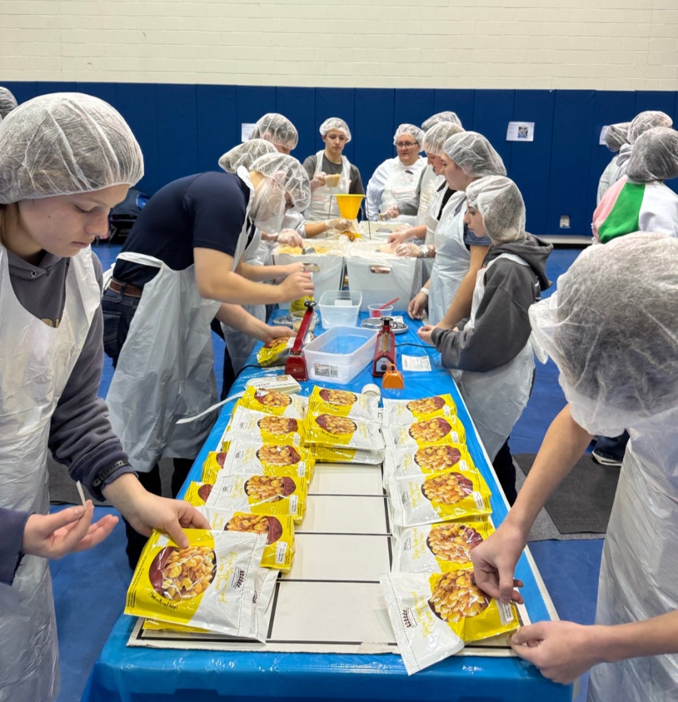 Members of the Brentsville FFA Chapter participate in the annual AgriMeals for Change event, where they pack hundreds of meals for those in need.