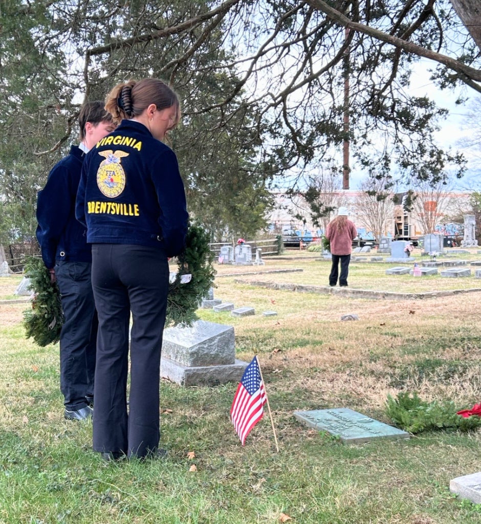 Brentsville FFA members participate in the Annual Wreaths Across America ceremony, laying wreaths on dozens of veterans' graves, demonstrating their chapter's commitment to community and service.