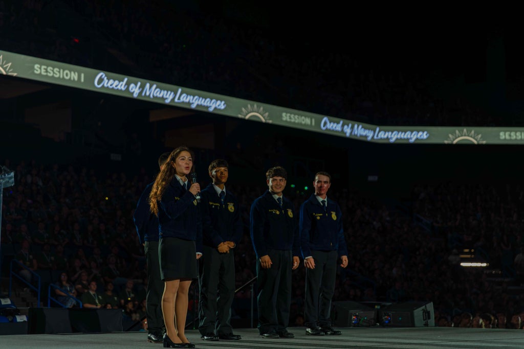 Kailie Wells presenting the fifth paragraph of the FFA Creed in Japanese. Photo taken by California FFA Press Corp. member Ryan Tolmosoff of the Merced-Stone Ridge Christian FFA Chapter.