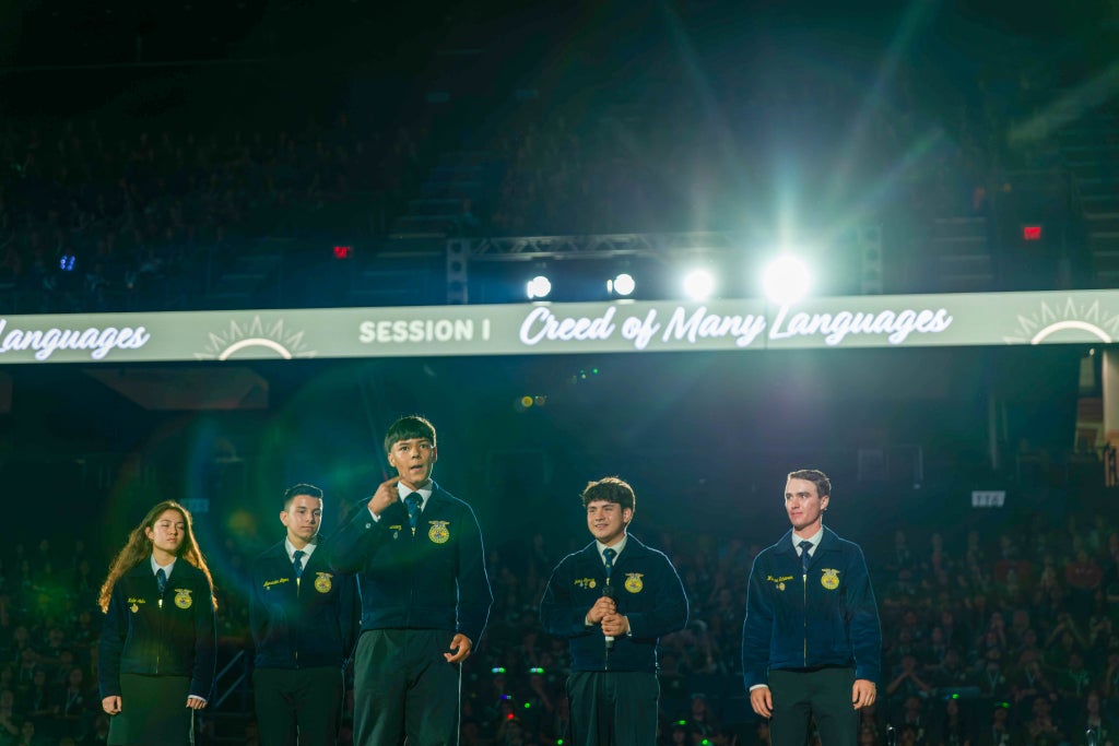 Elijah Hernandez presenting the third paragraph of the FFA Creed in American Sign Language. Photo taken by California FFA Press Corp. member Ryan Tolmosoff of the Merced-Stone Ridge Christian FFA Chapter.