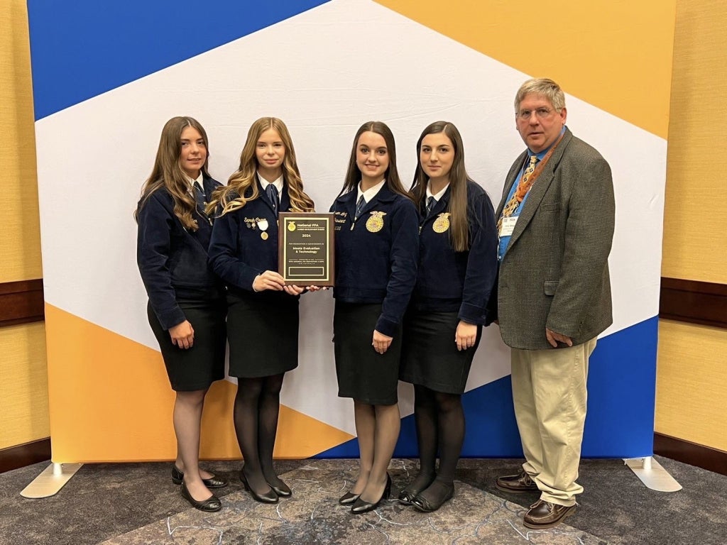 Carrie Miller, Sarah Craun, Grayson Long and Malaina Ritchie place first in meats evaluation at national convention.