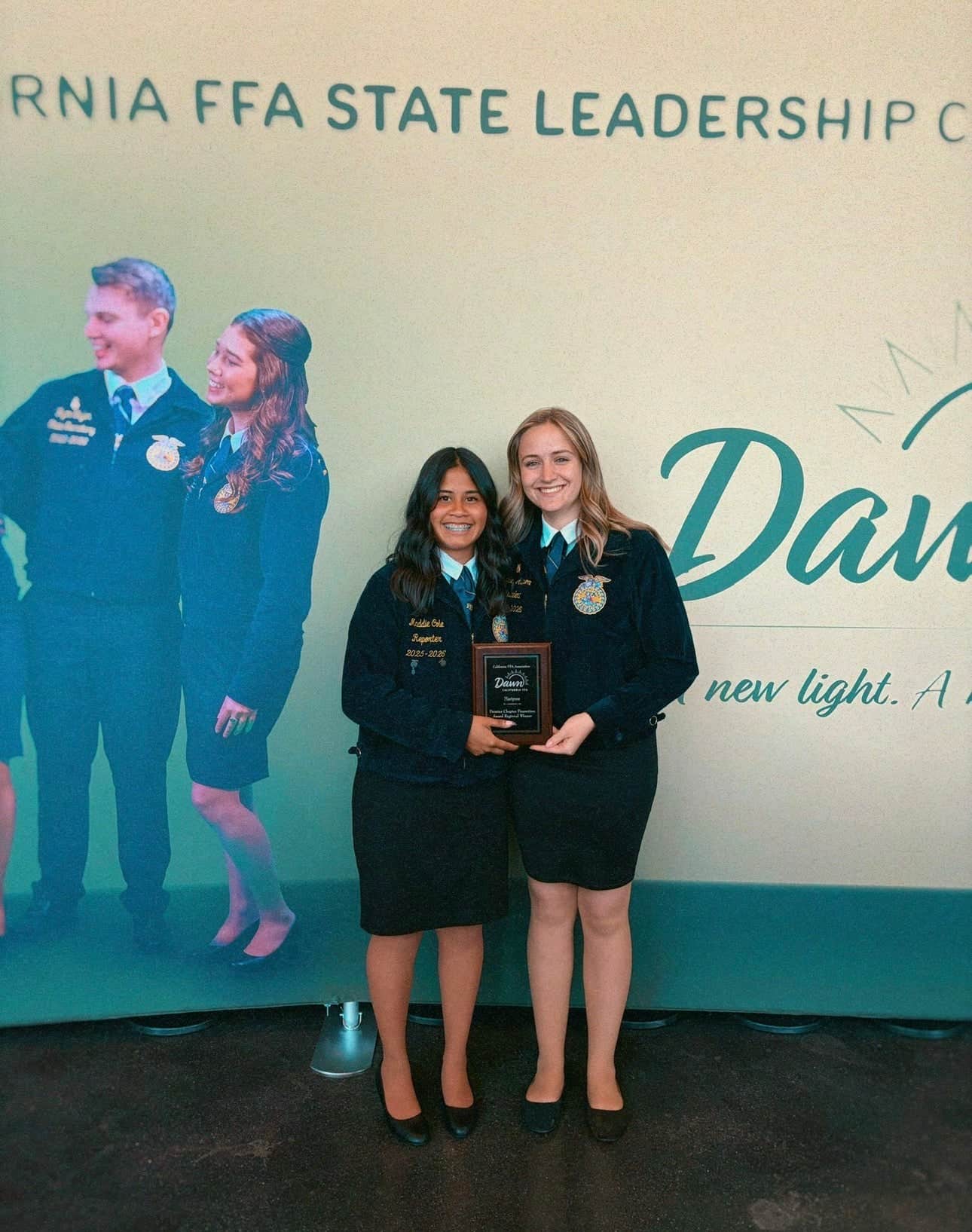 Cole and Paisley Allison receiving regional winner of Premier Chapter Promotion at the 2026 California State Conference.