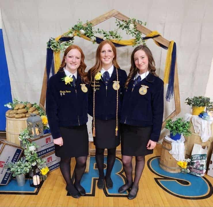 Three of the sisters who own Rustling Birches Ranch at the Mars Hill FFA Banquet. Left to right: Charlie Pierce, Julia Pierce and Aubrie Pierce.