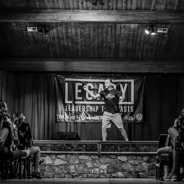 Barnes speaking at Oklahoma Alumni Leadership Camp.