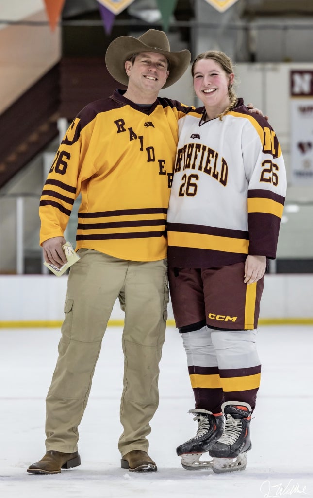 Mr. Austin at an FFA member’s (Josie Kuennen) senior night hockey game.