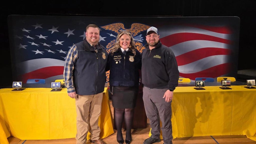 Andrew Sorrell (left), Delainey Haddix (middle) and local animal shelter director Adam Grubb (right).