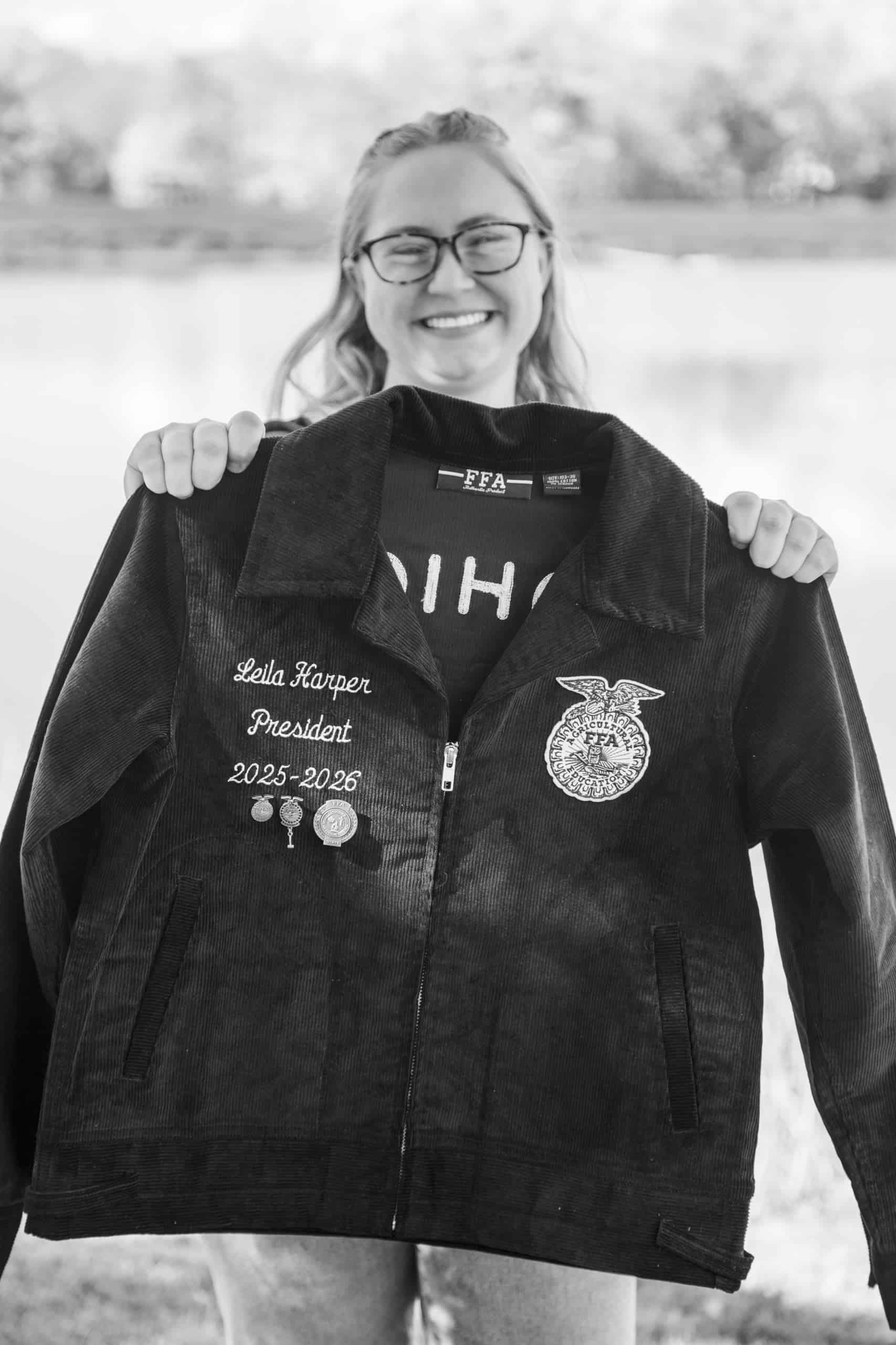 Holding my FFA jacket with “President” stitched on it and feeling proud of how far I have come!
