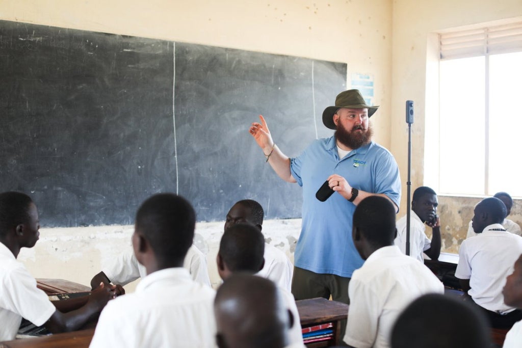 Dr. O.P. McCubbins teaching an agricultural education lesson in an international classroom.
