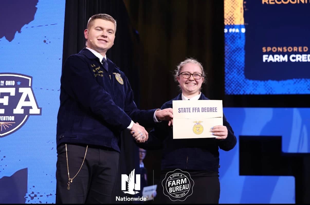Shaking hands with 2025-26 Ohio FFA President Carter Boyd while receiving my State FFA Degree at the 98th Ohio FFA Convention!