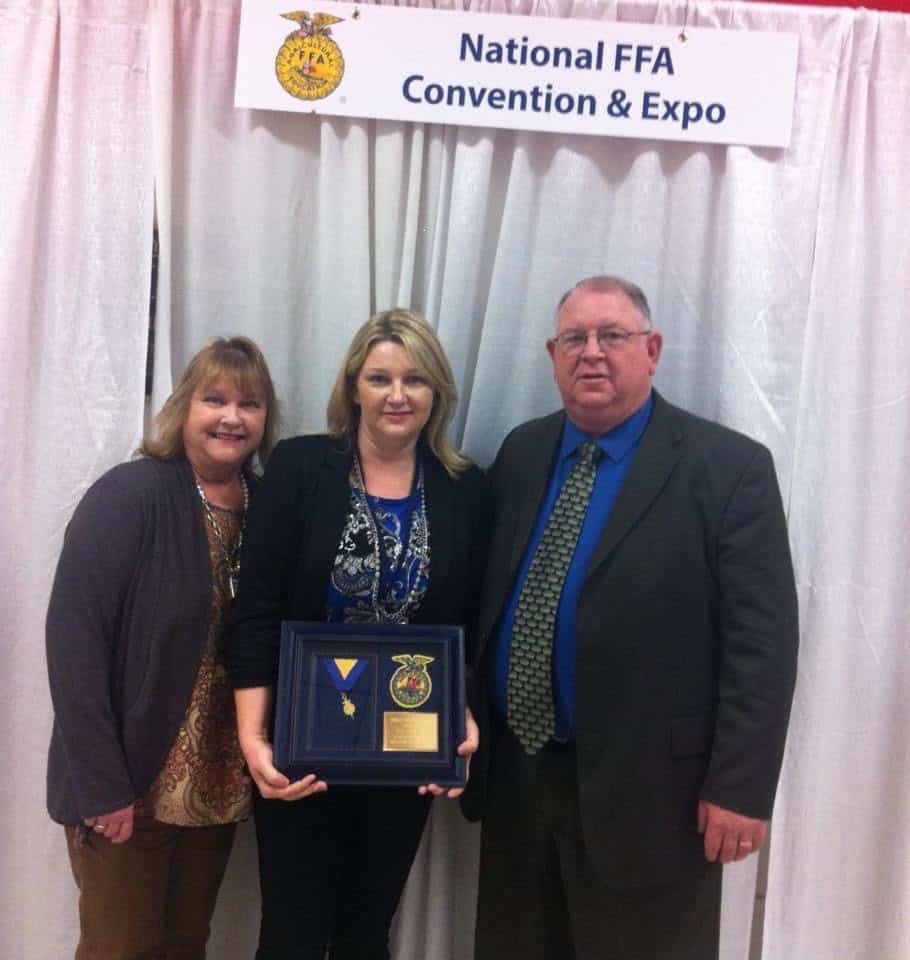 Sperling and her parents after she was awarded her Honorary American FFA Degree.