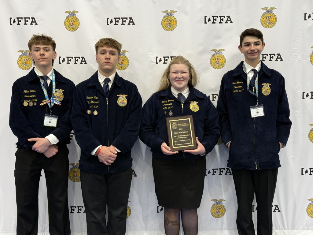 Nolan Davis, Lachlan Newell, Sierra Hemond and Joey Morello pose for a picture after winning the Maine FFA dairy evaluation career development event.